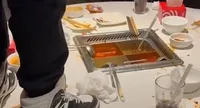 china court fines parents over teen urinating in hotpot restaurant