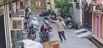 monkeys attacked bjp leader praveen sethi while on scooty in hapur cctv video