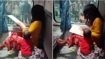 distressed woman breaks ac coach window in train viral video over purse theft with child