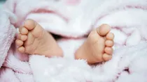 23 day old baby accidentally smothered while sleeping beside parents in UP