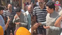 Jaipur Glass of Dirty Sewage Water Handed to BJP MLA Video viral