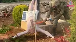 israel soldier destroying Jesus statue