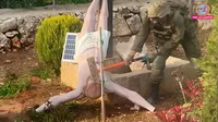 israel soldier destroying Jesus statue
