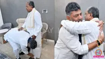 dk shivakumar emotional touches feet of cm siddaramaiah sparks questions about resignation karnataka politics