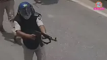 Bihar police firing AK-47 at student protest