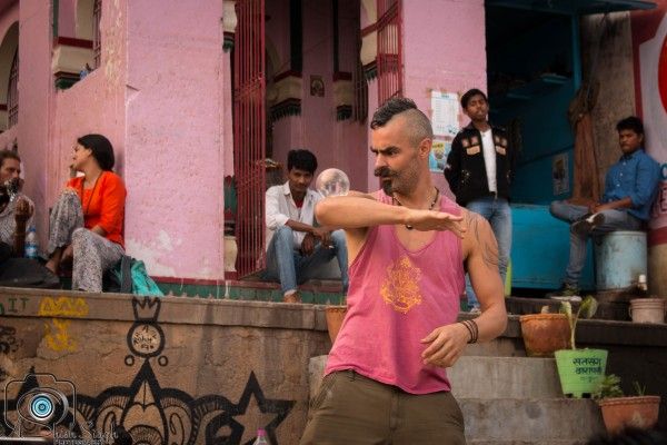 english juggler at banaras assi ghaat