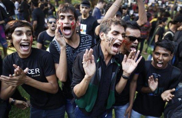 Gay rights activists shout slogans during a protest against the verdict by the Supreme Court in Mumbai December 15, 2013. India's Supreme Court on Wednesday reinstated a ban on gay sex in the world's largest democracy, following a four-year period of decriminalisation that had helped bring homosexuality into the open in the socially conservative country. In 2009 the Delhi High Court ruled unconstitutional a section of the penal code dating back to 1860 that prohibits "carnal intercourse against the order of nature with any man, woman or animal" and lifted the ban for consenting adults. The Supreme Court threw out that decision, saying only parliament could change Section 377 of the penal code, widely interpreted to refer to homosexual sex. Violation of the law can be punished with up to 10 years in jail. REUTERS/Danish Siddiqui (INDIA - Tags: CRIME LAW SOCIETY)
