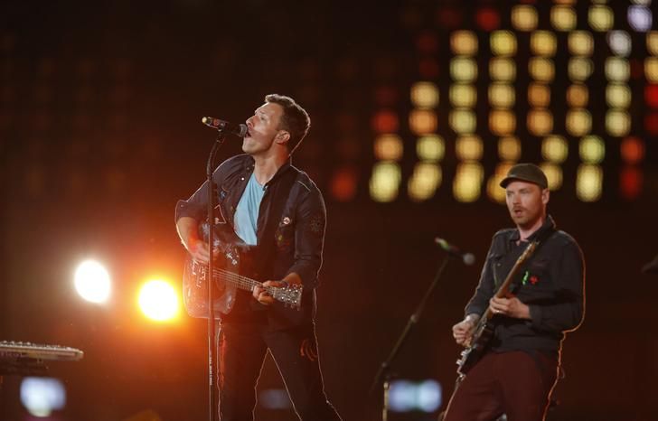 Chris Martin performs with his band Coldplay in the Olympic Stadium during the closing ceremony of the London 2012 Paralympic Games