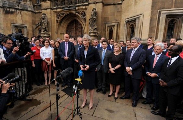 Theresa May outside the Houses of Parliament in Westminster, London, after she secured her place as the UK's second female prime minister through the surprise withdrawal of her only rival in the battle to succeed David Cameron. PRESS ASSOCIATION Photo. Picture date: Monday July 11, 2016. Energy Minister Andrea Leadsom offered Mrs May her "full support" after conceding that she had too little support among Tory MPs to deliver a "strong and stable government". See PA story POLITICS Conservatives. Photo credit should read: Dominic Lipinski/PA Wire