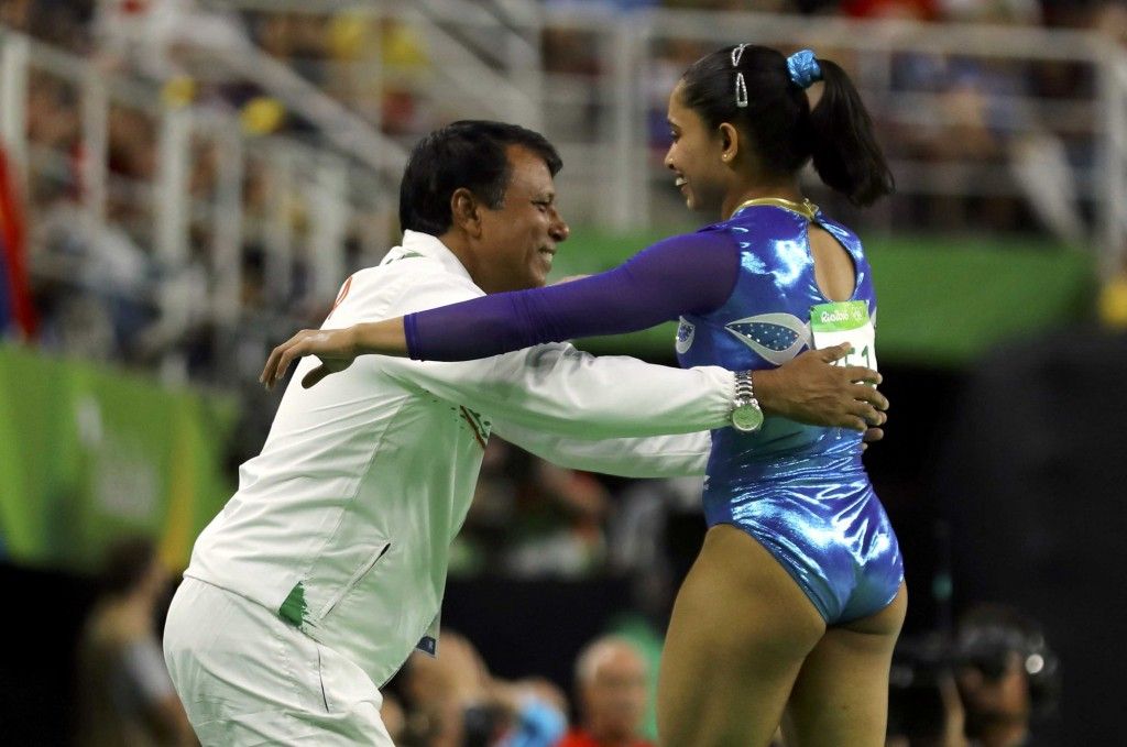  Dipa Karmakar (IND) of India reacts with her coach. REUTERS