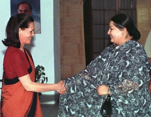 Jayaram Jayalalitha (R), leader of the regional All India Anna Dravida Munnetra Kazhagam party (AIADMK), a key partner in India's minority government, shakes hands with Sonia Gandhi, president of India's main opposition Congress party in New Delhi on April 15. Jayalalitha, whose party withdrew vital support for the government April 14, said it was up to the Congress party to form its own government or cobble together a coalition. KK/JIR/WS