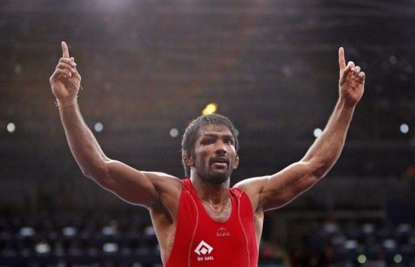India's Yogeshwar Dutt celebrates his victory over North Korea's Jong Myong Ri for the gold medal on the Men's 60Kg Freestyle wrestling at the ExCel venue during the London 2012 Olympic Games