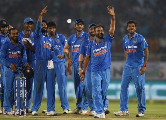 India's Amit Mishra, second right, gestures towards the pavilion as he celebrates with teammates after taking the fifth wicket of the fifth and last one day international cricket match against New Zealand's in Visakhapatnam, India, Saturday, Oct. 29, 2016. Indian won the series 3-2. (AP Photo/Aijaz Rahi)