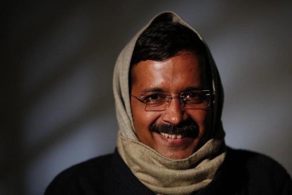 Delhi's Chief Minister Arvind Kejriwal, chief of the Aam Aadmi (Common Man) Party (AAP), smiles during an interview with Reuters at his residence on the outskirts of New Delhi January 27, 2014. The young anti-graft party that stormed to power in India's capital last month plans to field at least 73 candidates in national elections due by May to stand against politicians accused of crimes, its founder said on Monday. Following its strong performance in Delhi, interest in the year-old Aam Aadmi Party (AAP) has surged. Since an announcement earlier this month that it would contest the general election, its membership has passed 10 million. Picture taken January 27, 2014. REUTERS/Adnan Abidi (INDIA - Tags: POLITICS HEADSHOT) - RTX17XTW