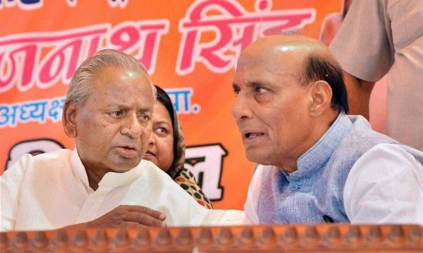 Kasganj: BJP President Rajnath Singh with senior party leader Kalyan Singh during a rally at Sidpura town of Kasganj, Uttar Pradesh on Sunday. PTI Photo(PTI4_20_2014_000105B) *** Local Caption *** 20-04-2014 Kasganj :- Mr. Rajnath Singh, National President of BJP, Mr. Kalyan Singh, National Vice-President and former CM of UP and Mr. Rajveer Singh Raju contesting candidate of Loksbha Etah seat of BJP addressing a public rally at the Sidpura Town of Kasganj on 20.04.2014 (Sunday). Photo Manoj Aligadi