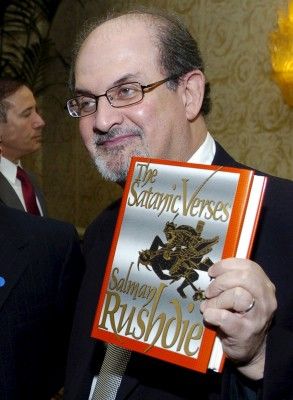 Author Salman Rushdie (R) poses with his 1988 book "The Satanic Verses" alongside fellow honoree Tashbih Sayyed before the American Jewish Conference's 30th Annual Dinner, "Profiles in Courage: Voices of Muslim Reformers in the Modern World," in Beverly Hills, California in this September 17, 2006 file photo. Iranian state-run media outlets in February 2016 have added $600,000 to a bounty for the killing of British author Rushdie imposed in 1989 over the publishing of his book "The Satanic Verses". REUTERS/Chris Pizzello/Files TPX IMAGES OF THE DAY
