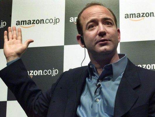 Amazon.com Inc founder and chief executive Jeff Bezos speaks during a news conference in Tokyo November 1, 2000. Amazon, the number one Internet retailer, unveiled its Japanese site Amazon.co.jp on Wednesday in an aggressive push to crack open Japan's cosy book retailing market. TA/HL