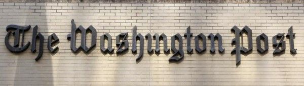 The sign above the entrance of the Washington Post headquarters is pictured in Washington, August 5, 2013. Amazon.com Inc founder Jeff Bezos will buy the Washington Post newspaper for $250 million in a surprise deal that ends the Graham family's 80-year ownership and hands one of the country's most influential publications to the tech entrepreneur. Bezos, hailed by many as a visionary who helped transform Internet retail, called his acquisition a personal endeavor and reassured Post employees and readers he will preserve the paper's journalistic tradition, while driving innovation. REUTERS/Stelios Varias (UNITED STATES - Tags: MEDIA BUSINESS)