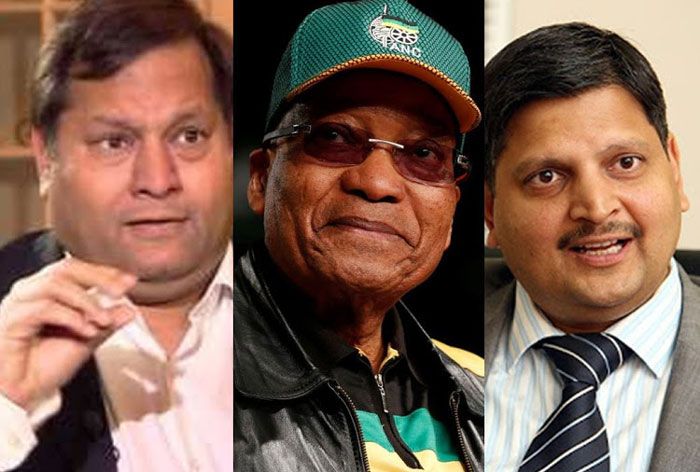 तस्वीर में बाईं ओर हैं अजय गुप्ता. बीच में राष्ट्रपति जैकब जुमा. दाहिनी ओर अतुल गुप्ता. 