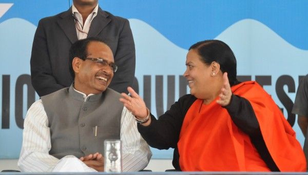 Shivraj Singh Chauhan, Chief Minister of Madhya Pradesh (Shivraj Singh Chouhan) with Uma Bharti, former Chief Minister of Madhya Pradesh and BJP Leader in Bhopal, Madhya Pradesh, India. (Politics, Politician). Photographs by Pankaj Tiwari