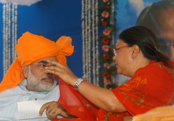Narendra Modi, Chief Minister of Gujarat with Vasundhara Raje Scindia, Chief Minister of Rajasthan at Ahmedabad in Gujarat