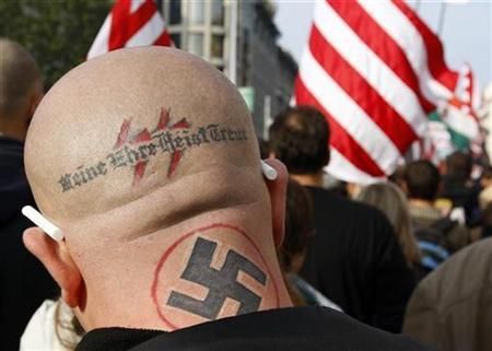 A supporter of the Hungarian radical right-wing party "Jobbik" attends a rally in Budapest