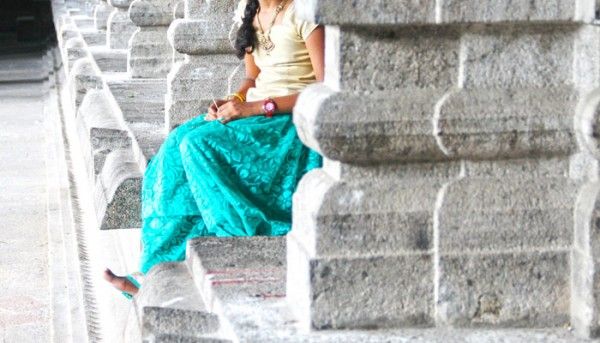 Girl Sitting Near Pillars 2090592 700