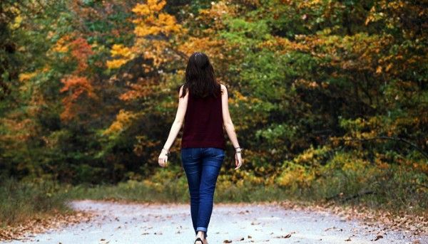 Woman In Brown Sleeveless Dress And Blue Jeans Standing On 906106 700