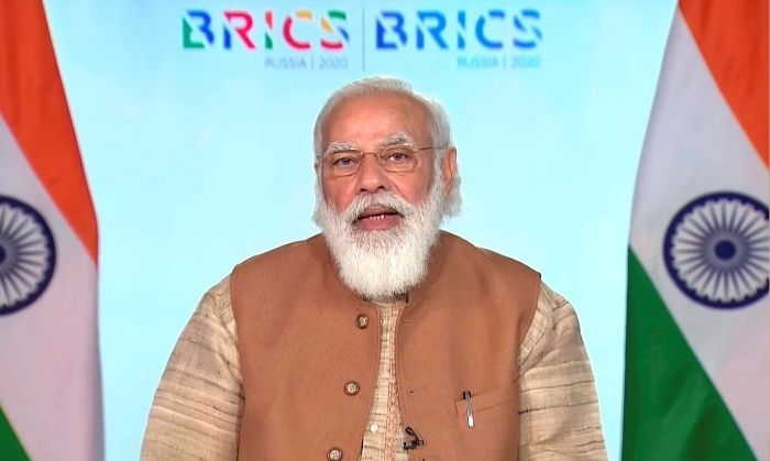 कोविड-19 के चलते 2020 में ब्रिक्स देशों का सम्मेलन, वर्चुअली हुआ था. उसी दौरान 17 नवंबर को भारत के PM मोदी वीडियो कॉनफ़्रेंस से ब्रिक्स देशों के प्रतिनिधियों को संबोधित करते हुए. (तस्वीर: PTI) 