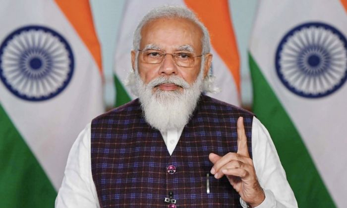 IMC को संबोधित करते PM नरेंद्र मोदी. (तस्वीर: PTI)