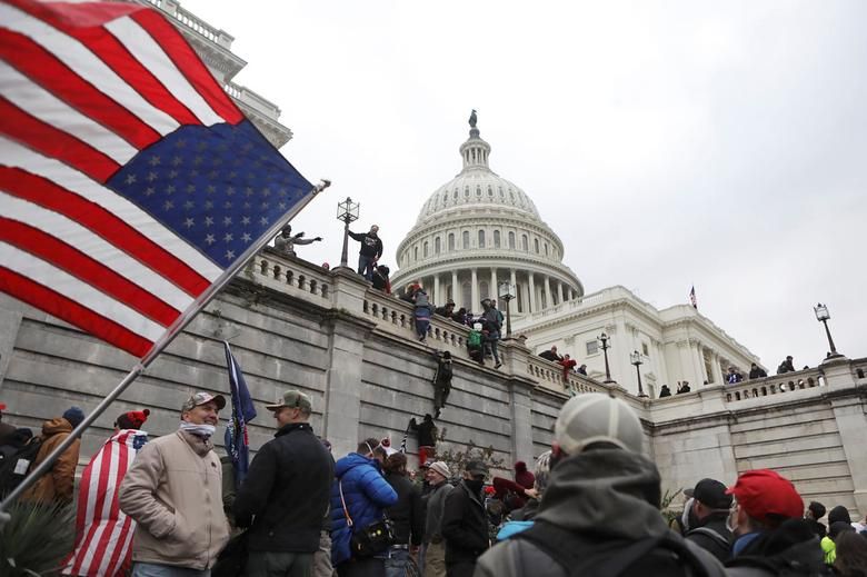 Supporters Of President Trump Scale The Walls Of The Capitol Building, January 6. Reuters:jim Urquhart