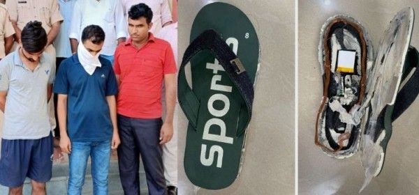 चप्पल में डिवाइस लगाकर नकल करते पकड़े गए लोग. (PTI)
