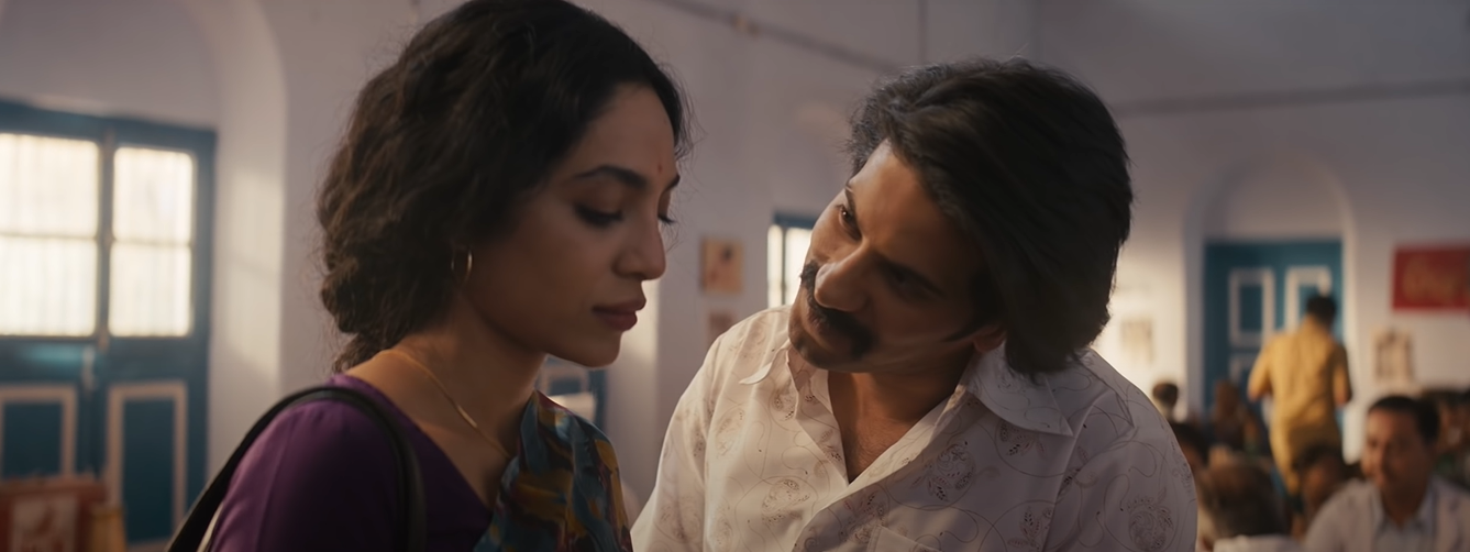 फिल्म 'कुरूप' के एक सीन में शोभिता धुलिपाला और दुलकर सलमान.