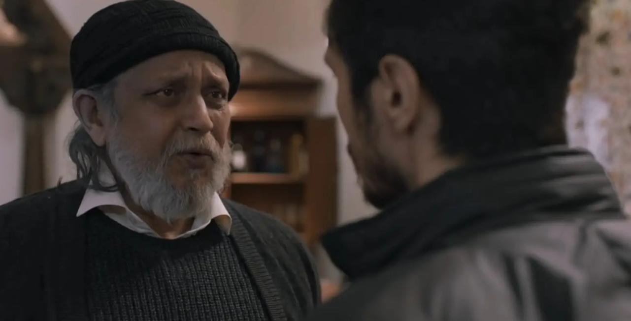 मिथुन ने पुष्कर के मित्र ब्रह्मदत्त का रोल किया है, जो कि पेशे से रिटायर्ड ब्यूरोक्रेट है.