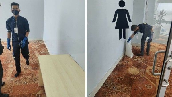 किबला को प्रार्थन रूम से हटाता सफाई कर्मी (फोटो फेसबुक)